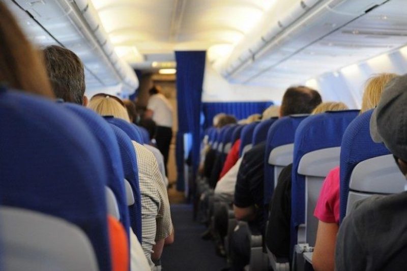 airplane_on_board_seats_people_travel_transportation_aisle-745740-700x465-676x450.jpg